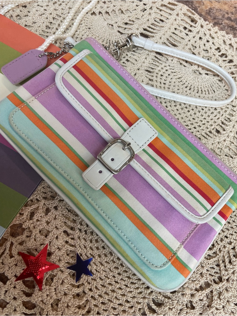 Coach Hampton striped wristlet with her Coach gift bag. - Picture 2 of 8